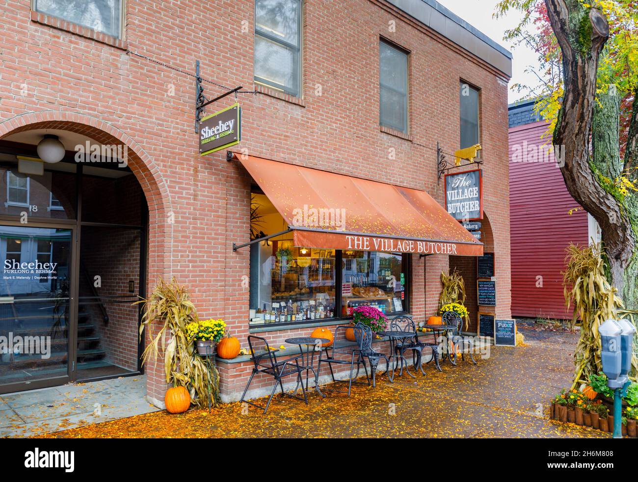 Brown awning above the shopfront of local deli 'The Village Butcher' in Woodstock, Vermont, New England, USA Stock Photo