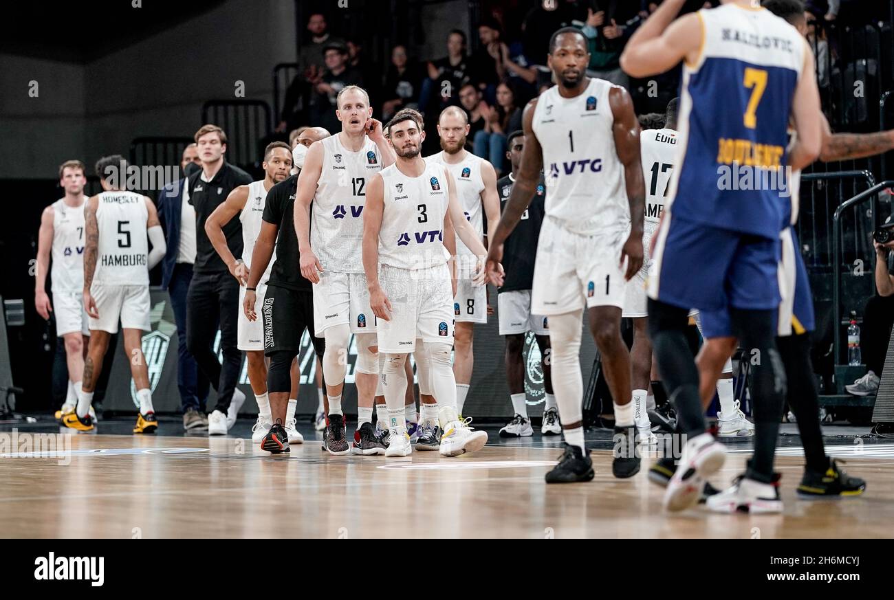Hamburg, Germany. 16th Nov, 2021. Basketball: Eurocup, Hamburg Towers - Boulogne Metropolitans 92, preliminary round, Group A, Matchday 5, edel-optics.de Arena. Hamburg's players leave the arena after the final whistle. Credit: Axel Heimken/dpa/Alamy Live News Stock Photo