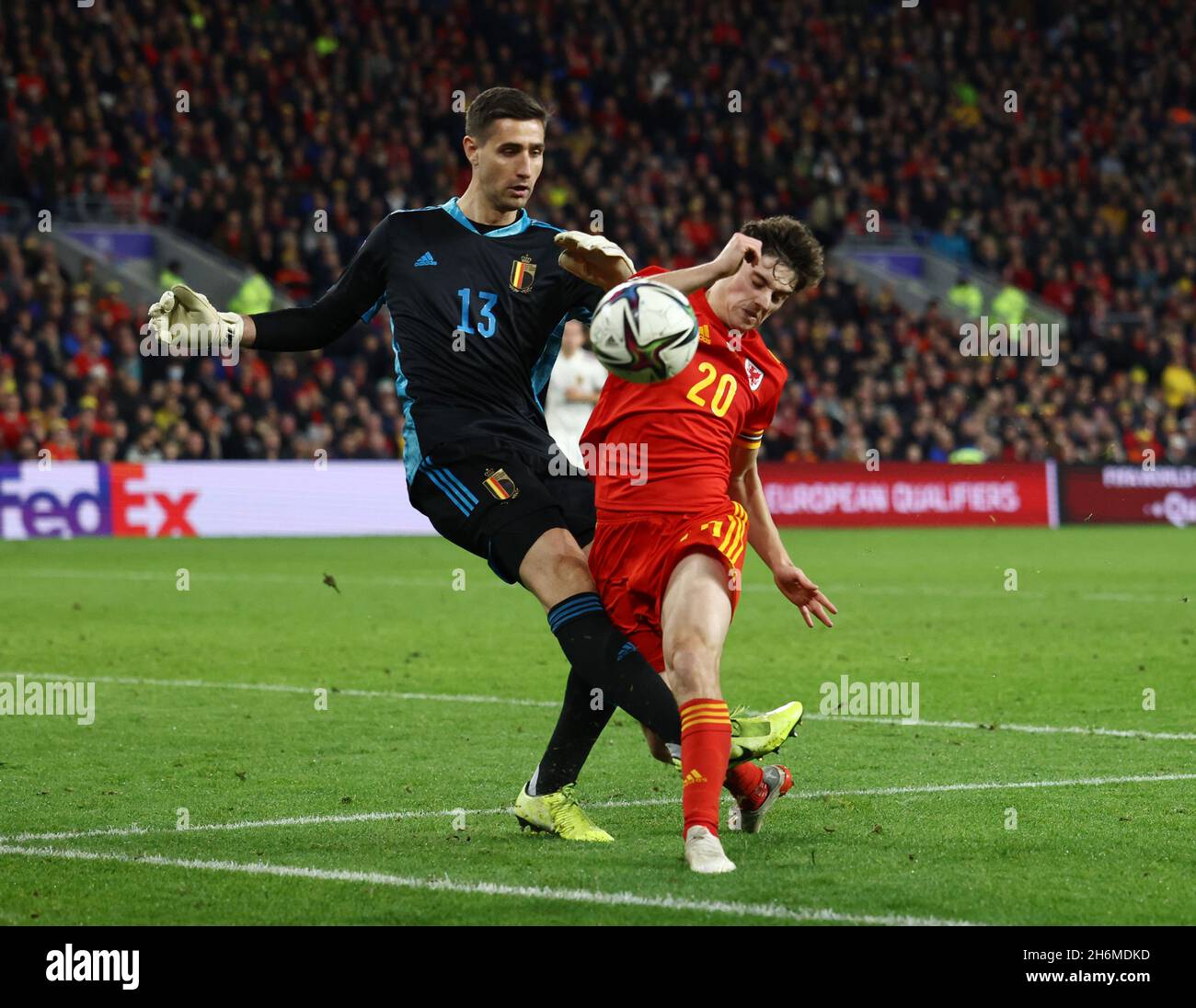 Cardiff, Wales, 16th November 2021. Koen Casteels of Belgium closed down by Daniel James of Wales  during the FIFA World Cup 2022 European Qualifying match at the Cardiff City Stadium, Cardiff. Picture credit should read: Darren Staples / Sportimage Stock Photo