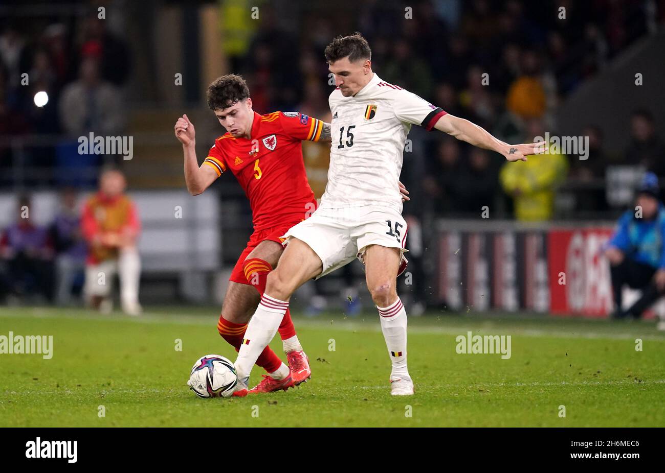 Wales' Neco Williams (left) and Belgium's Thomas Meunier battle for the ball during the FIFA World Cup Qualifying match at the Cardiff City Stadium, Cardiff. Picture date: Tuesday November 16, 2021. Stock Photo