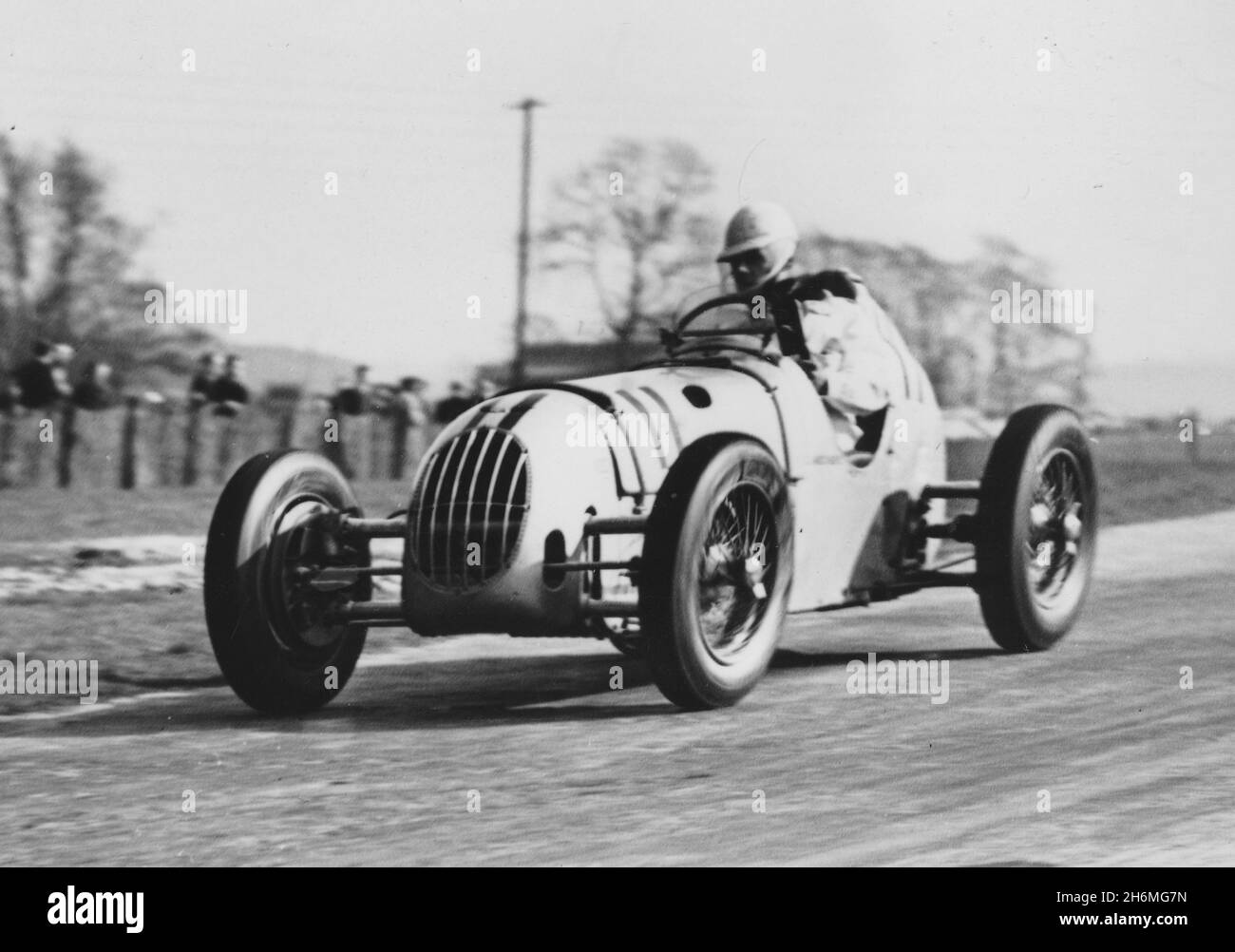 George Abecassis, supercharged 1488cc, 4 cyl  Alta at  Donington Park near Derby. 1st April 1939. BRDC organised British Empire Trophy Race. Photograph taken by T W Green, who was a Nottingham Journal press photographer at the time. Stock Photo