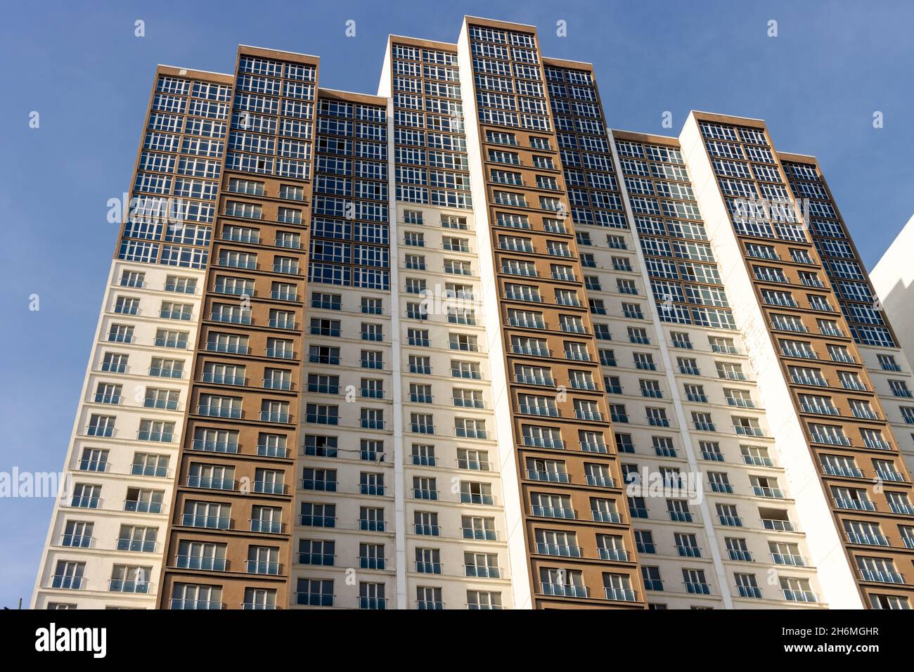 View of New apartment skyscraper building construction. Urban city house ...