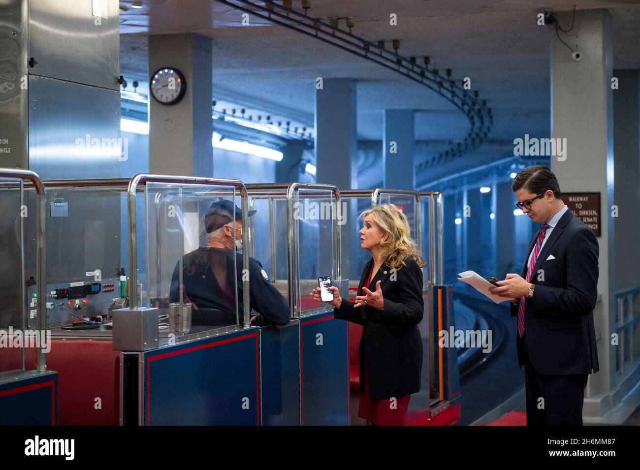 United States Senator Marsha Blackburn (Republican of Tennessee) talks with a Senate subway train operator as she arrives at the US Capitol during a vote in Washington, DC, Tuesday, November 16, 2021. Credit: Rod Lamkey/CNP Stock Photo