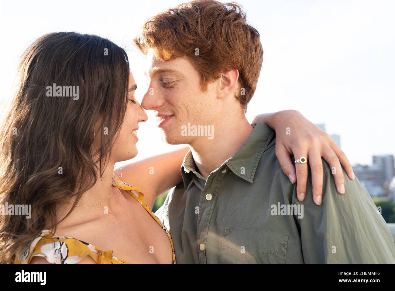 Couple with arm around each other hi-res stock photography and images ...