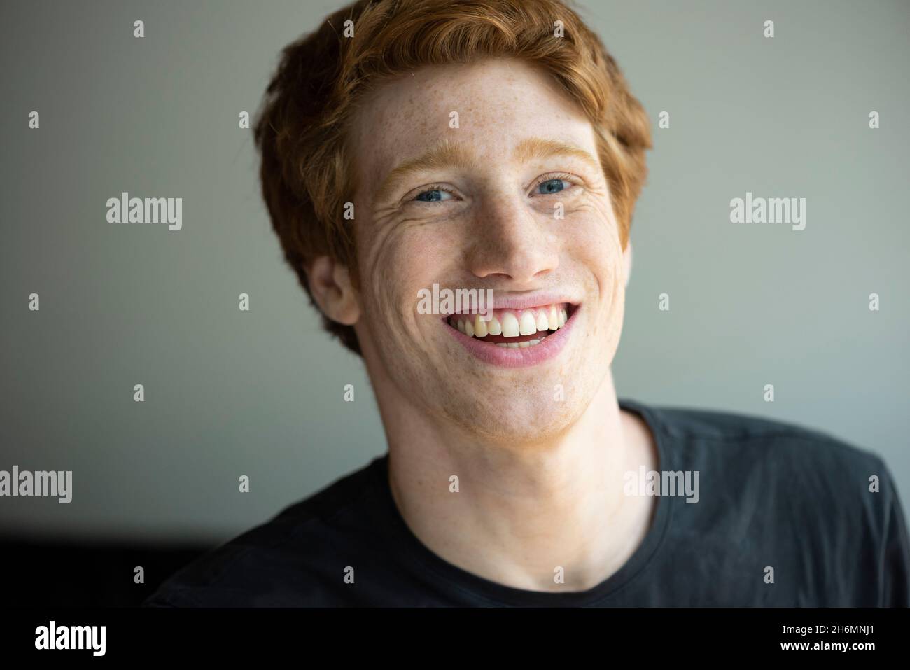Portrait of smiling young man Stock Photo