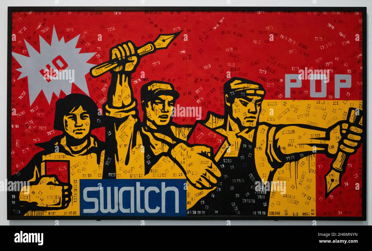 The painting Great Criticism by Wang Guangyi on show at the Tate Modern in London UK on 15 November 2021. This Pop Art painting was presented to the g Stock Photo