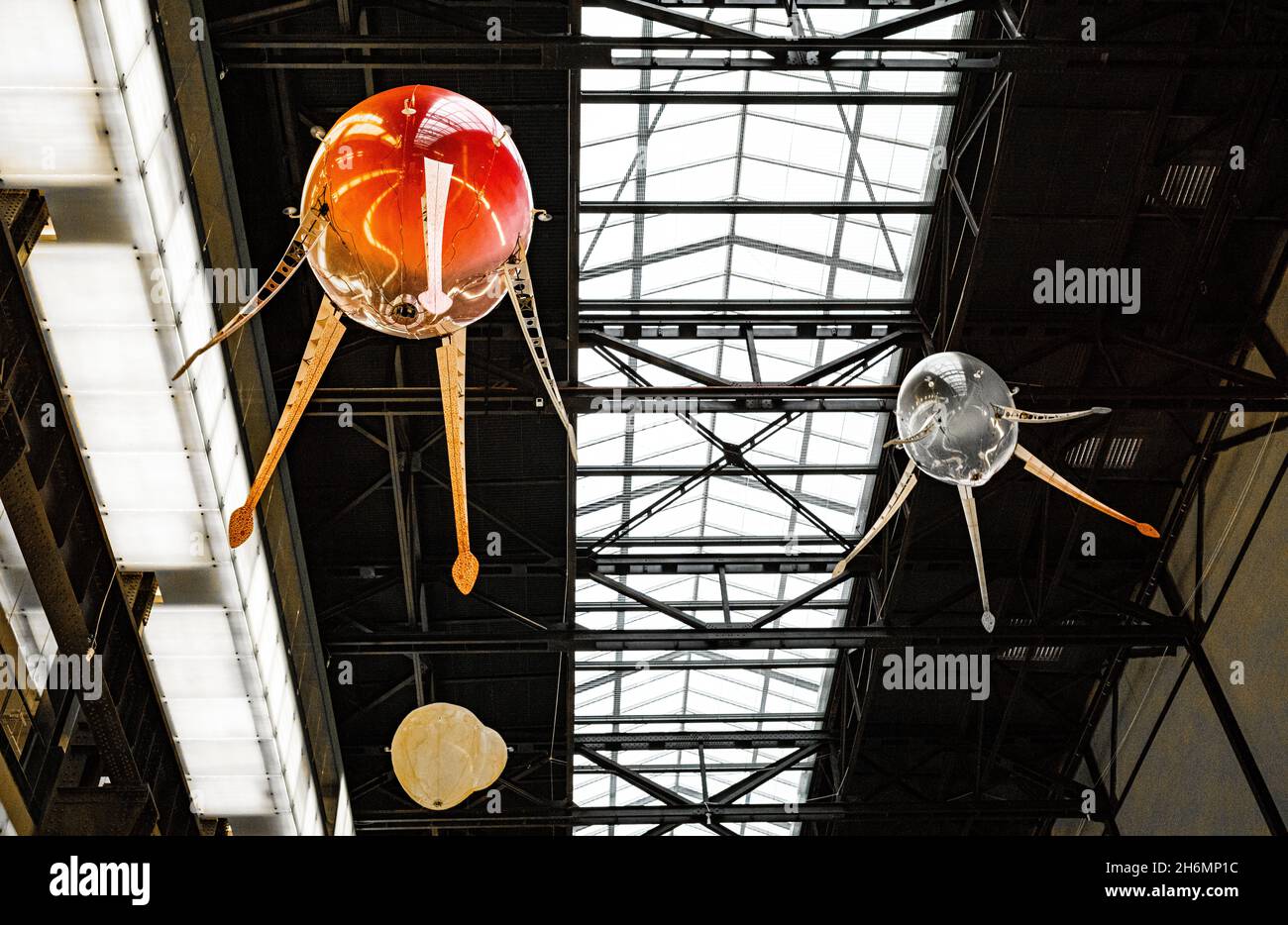 An installation by artist Anicka Yi sees machines called Aerobes hover and float in the air in the Turbine Hall at the Tate Modern Gallery in London, Stock Photo
