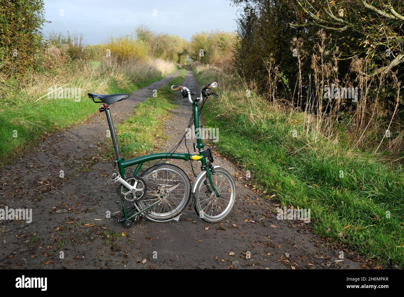 August 2021 - British built Brompton M6L folding bike in a country lane in rural Somerset, England, UK. Stock Photo