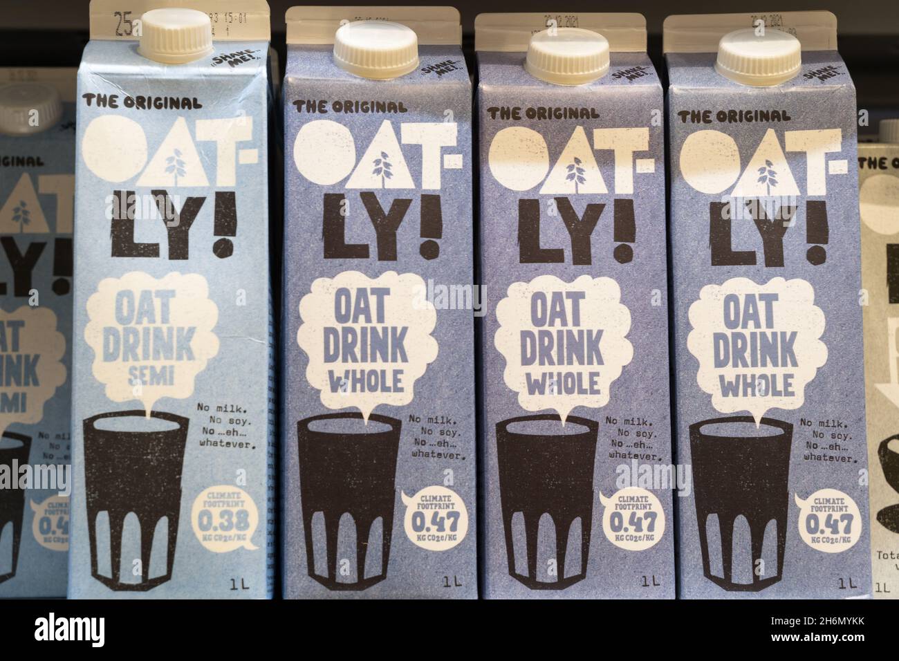 Four cartoons of Oatly oat Drink Whole fat, full fat Stock Photo