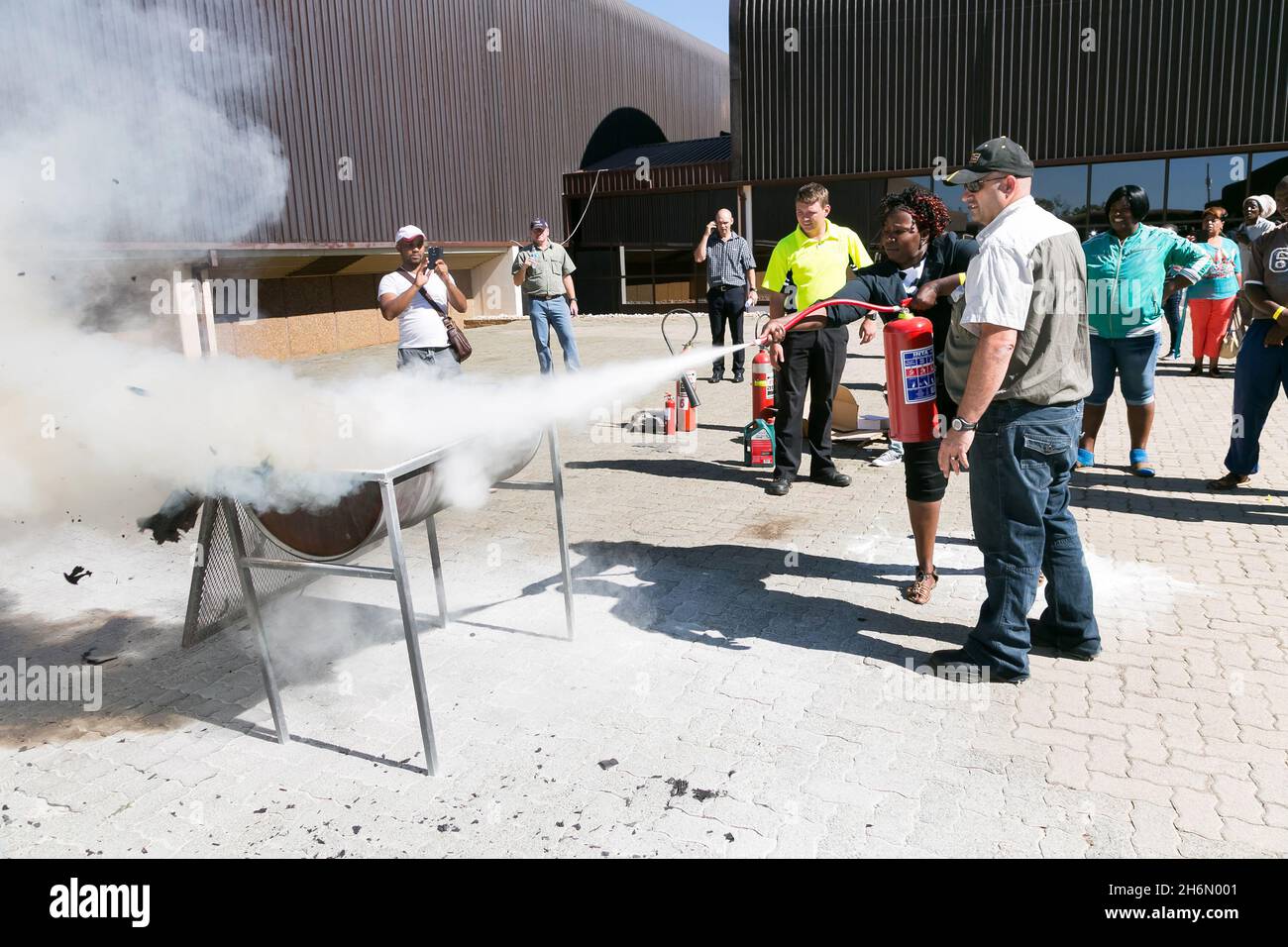 JOHANNESBURG, SOUTH AFRICA - Aug 12, 2021: Johannesburg, South Africa - November 5, 2014: Fire hazard training with a powder-based extinguisher Stock Photo