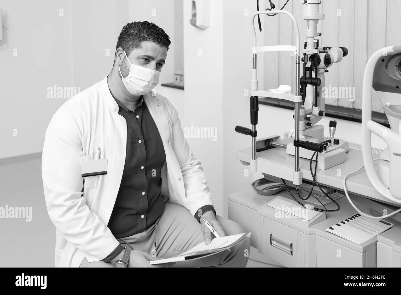 Eye doctor in mask Black and White Stock Photos & Images - Alamy