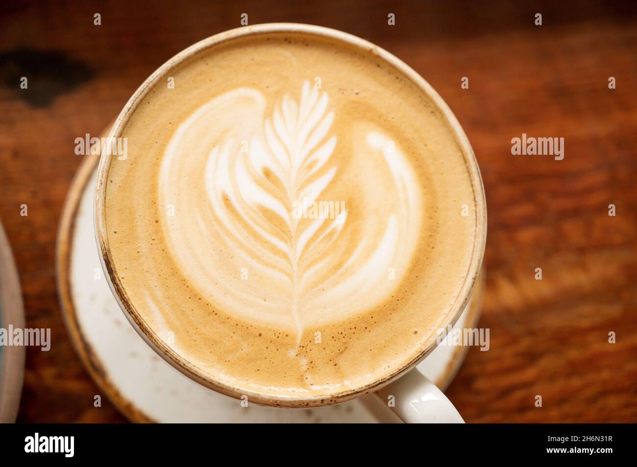 Cappuccino coffee drink at a trendy coffee shop. Stock Photo
