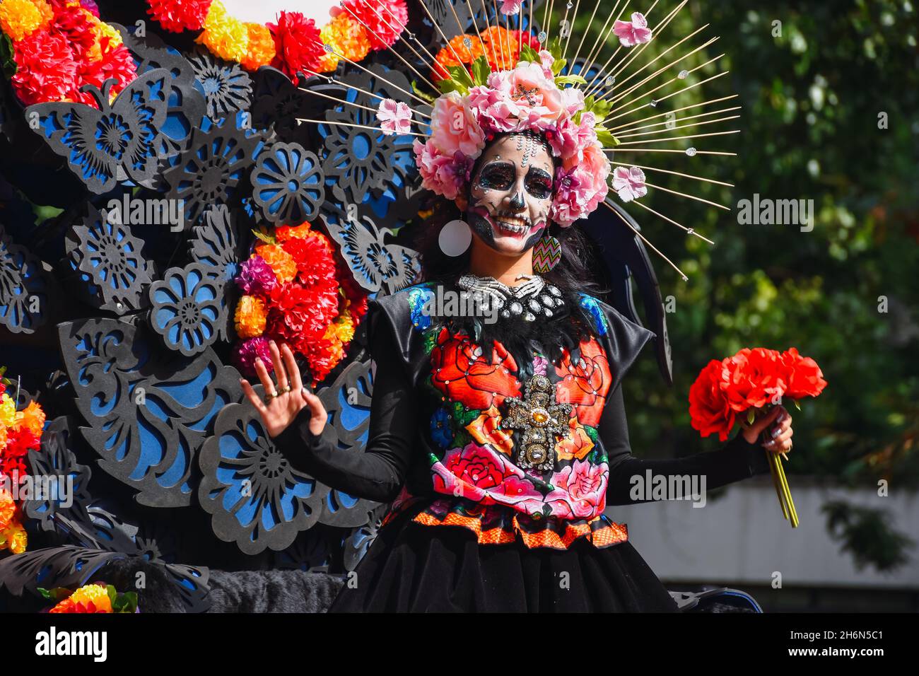 Mexico City, Mexico ; October 31 2021:  Day of the Dead, people in disguise during the Day of the Dead parade Stock Photo