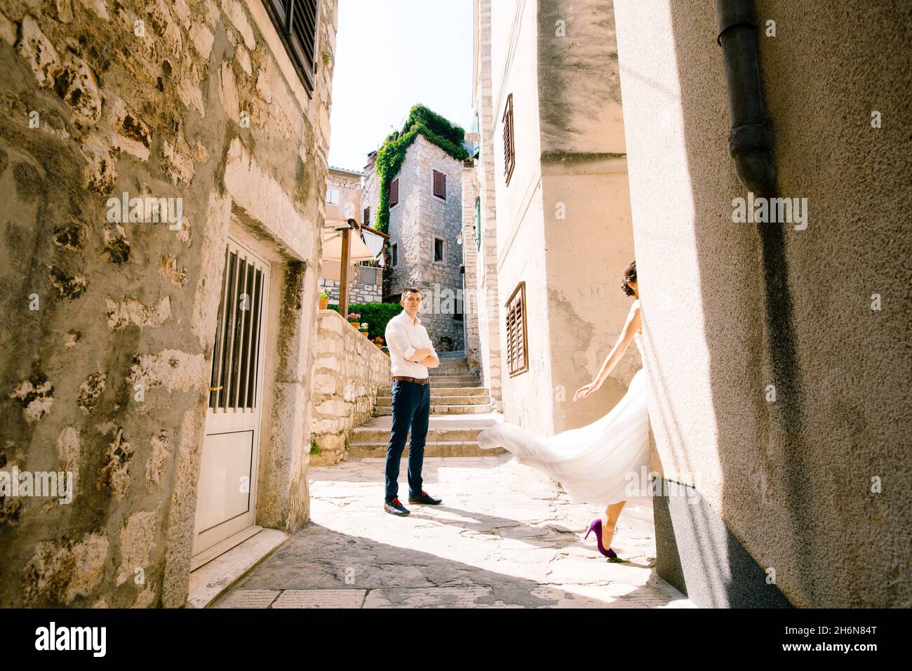 Woman arms around man wedding hi-res stock photography and images - Alamy