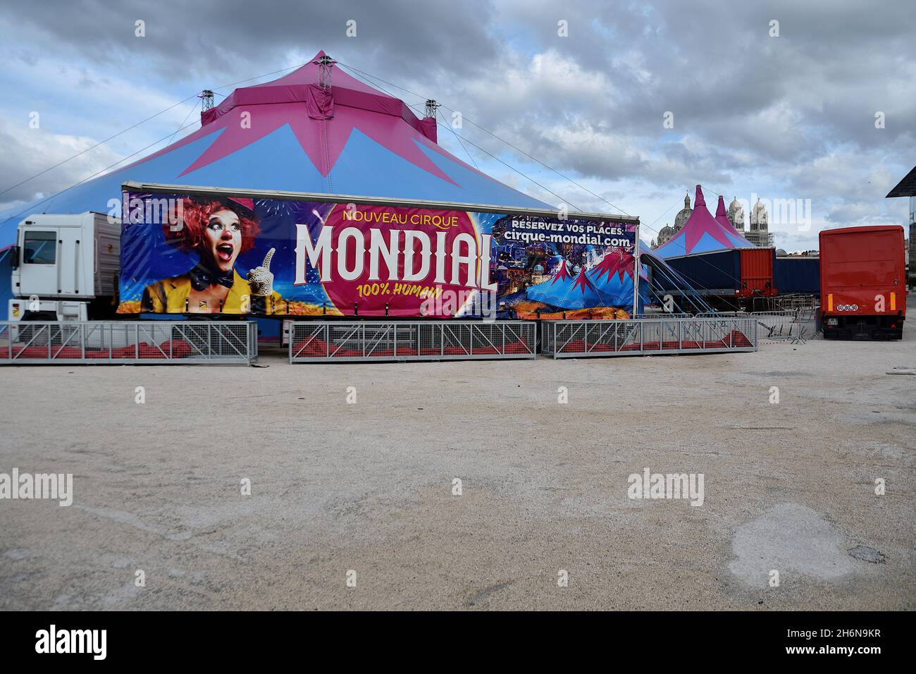 A circus trailer truck seen in front of a circus tent.The "Mondial
