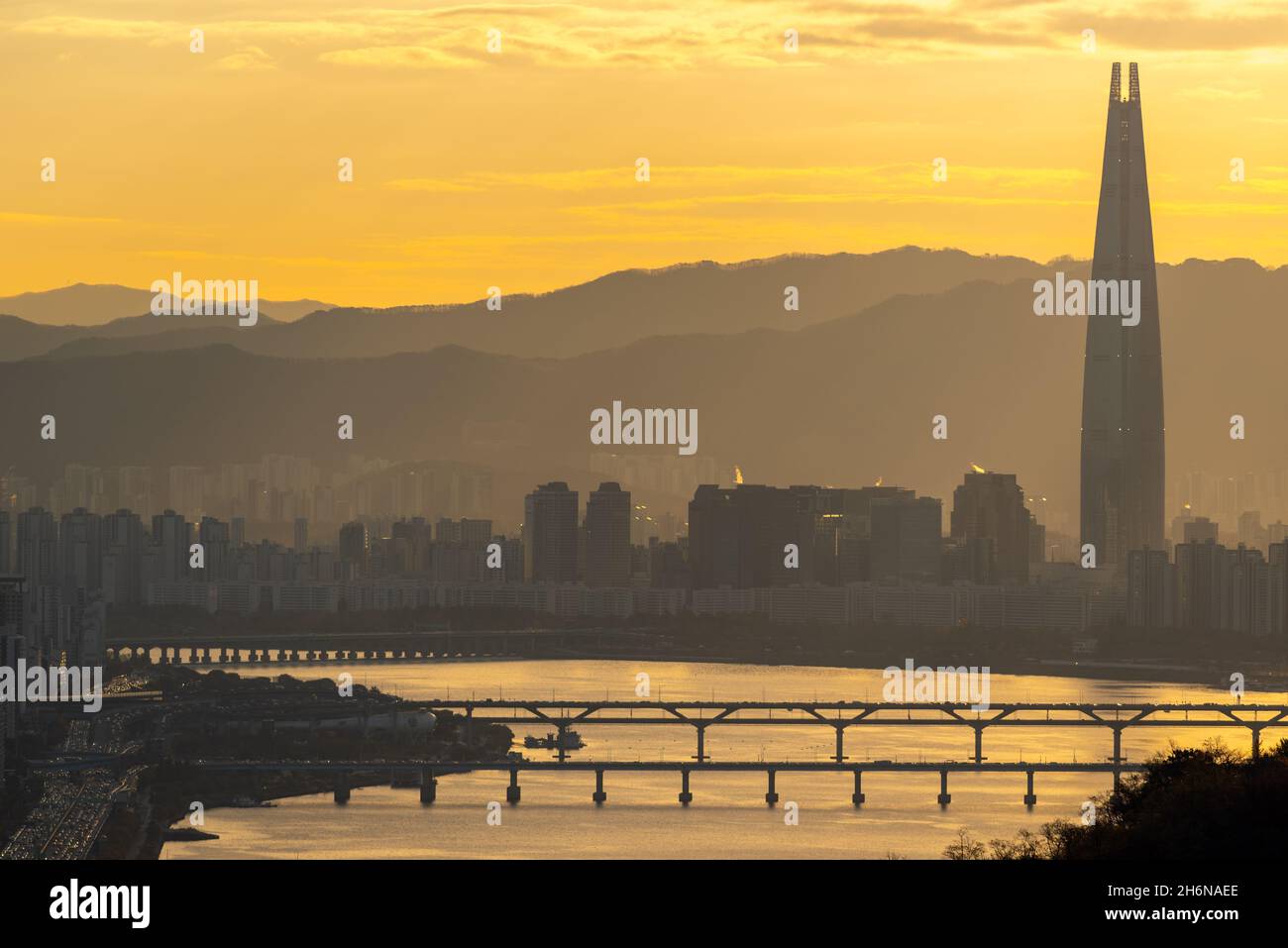 Sunrise view of Lotte World Tower skyscraper and Han river in Seoul South Korea on November 11 2021 Stock Photo