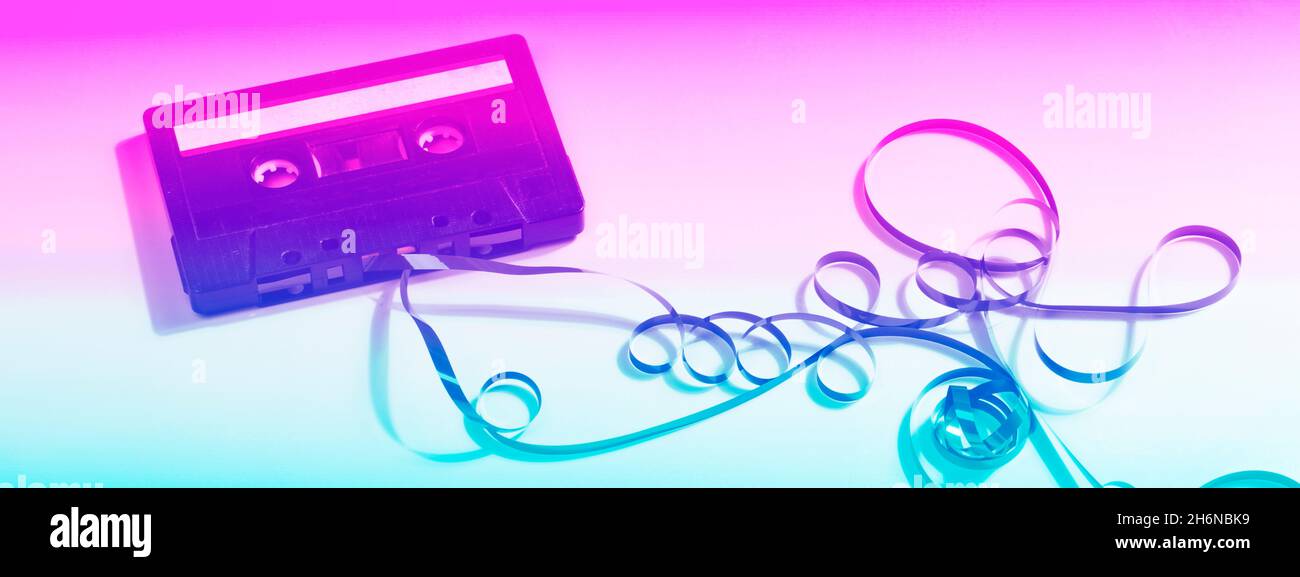 old cassette tape in neon color. retro style. vintage music concept. copy space Stock Photo Alamy