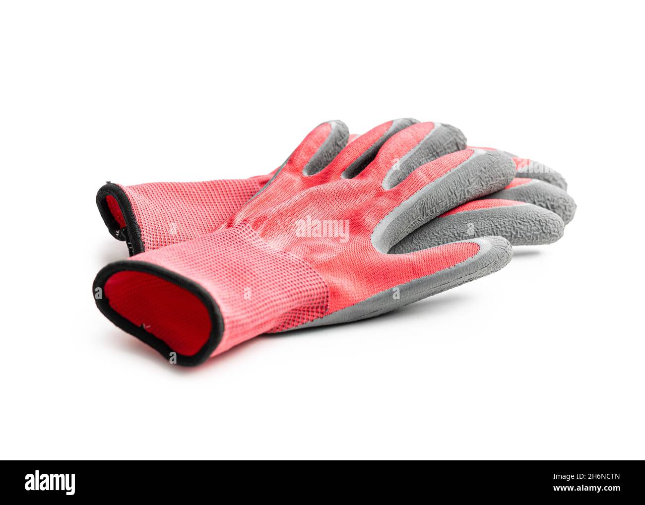 Textile work gloves with rubber isolated on white background. Stock Photo