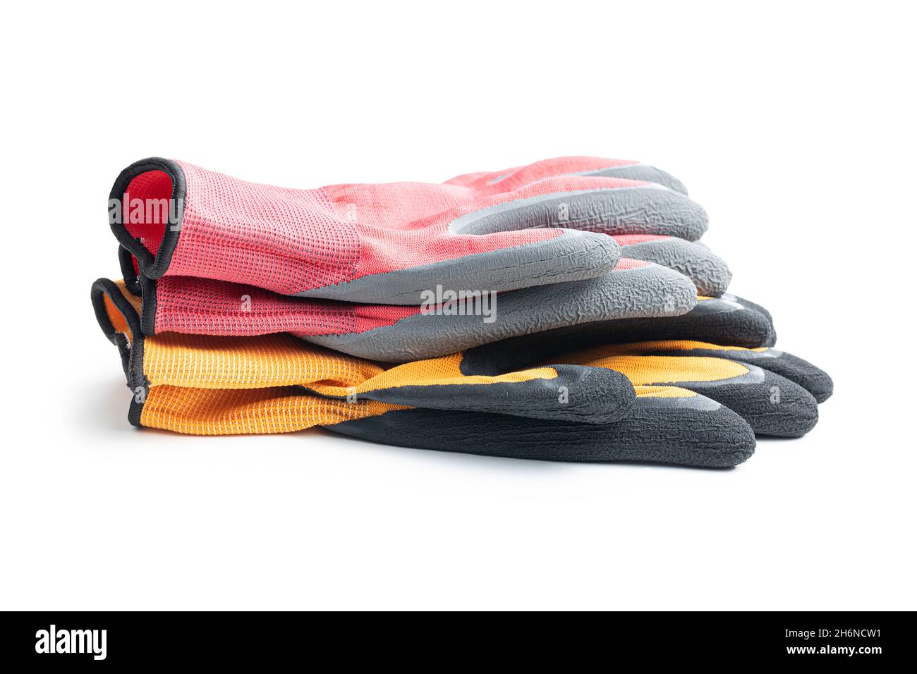 Textile work gloves with rubber isolated on white background. Stock Photo
