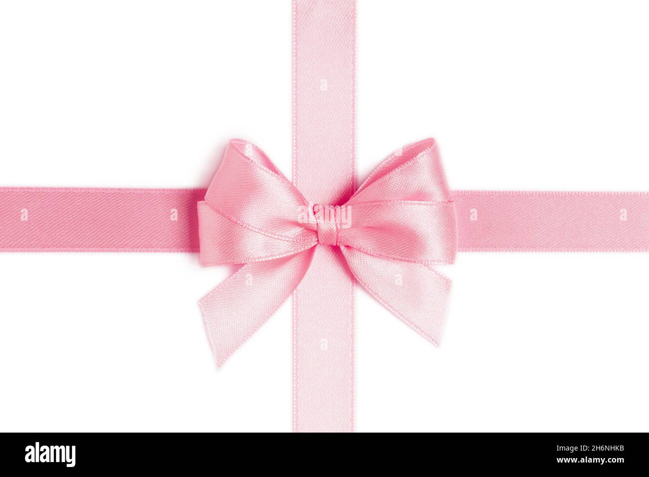 Beautiful pink ribbon with bow isolated on white background Stock
