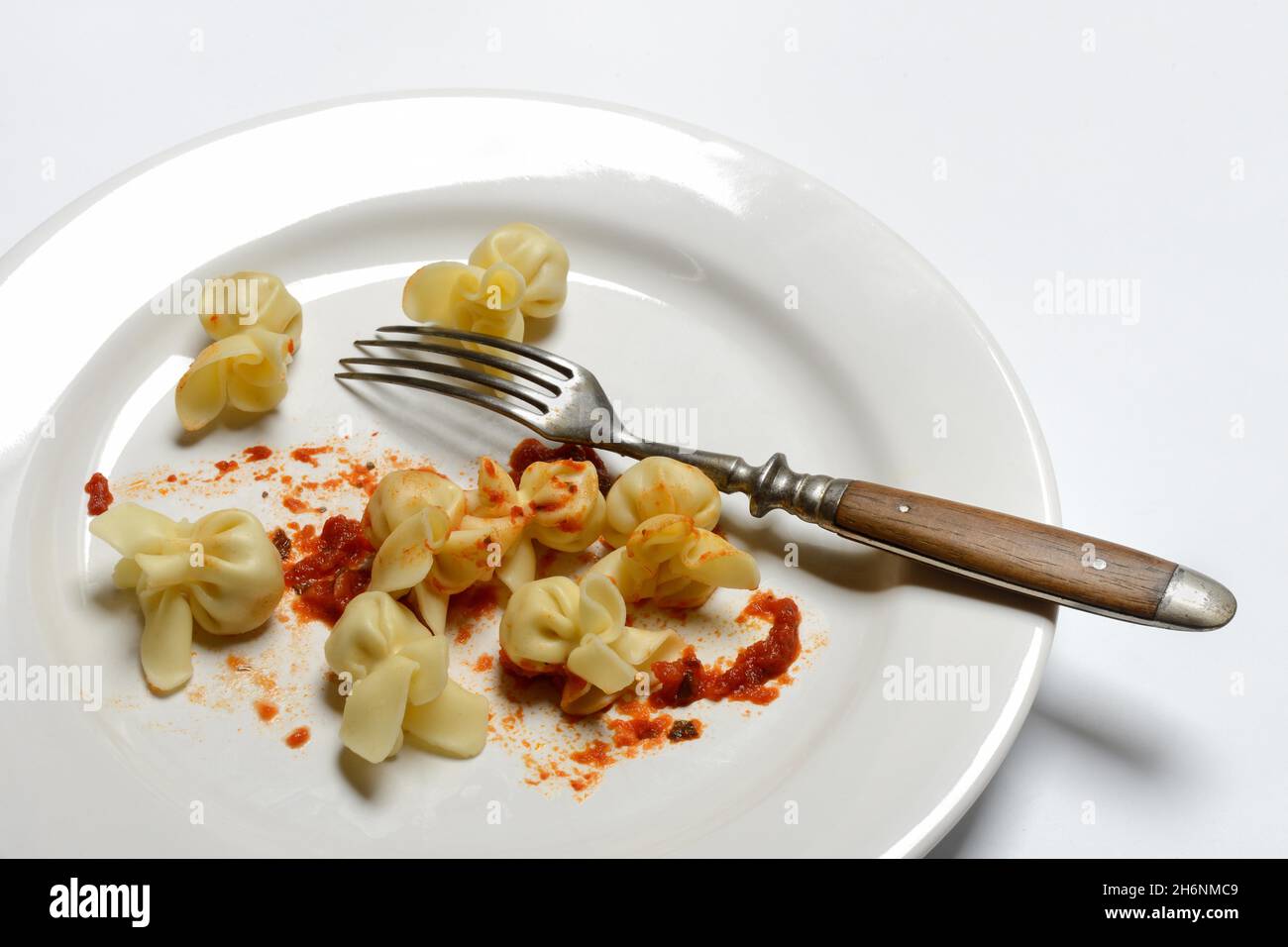 Saccottini, Italian pasta on plate with fork, pasta Stock Photo - Alamy