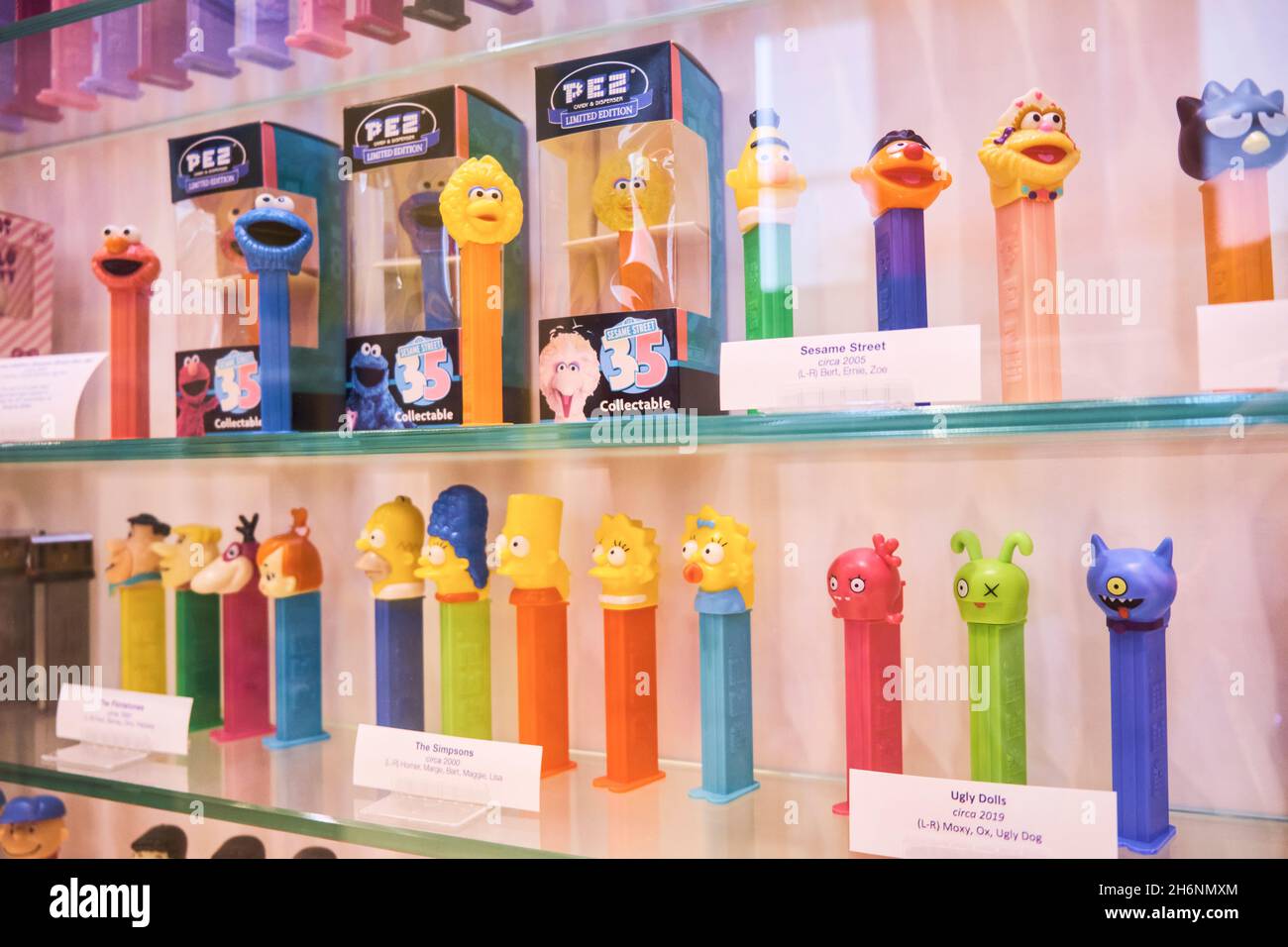 Sesame Street, Simpsons, Ugly Dolls, Flintstones dispensers. At the Pez factory, museum, visitor center in Orange, Connecticut. Stock Photo