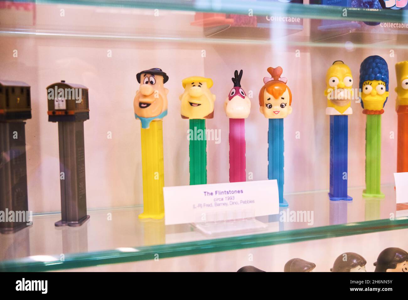 Flintstones Fred, Barney, Dino, Pebbles dispensers. At the Pez factory, museum, visitor center in Orange, Connecticut. Stock Photo