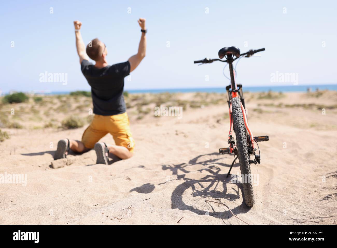 Male cyclist riding rejoicing of win competition Stock Photo - Alamy