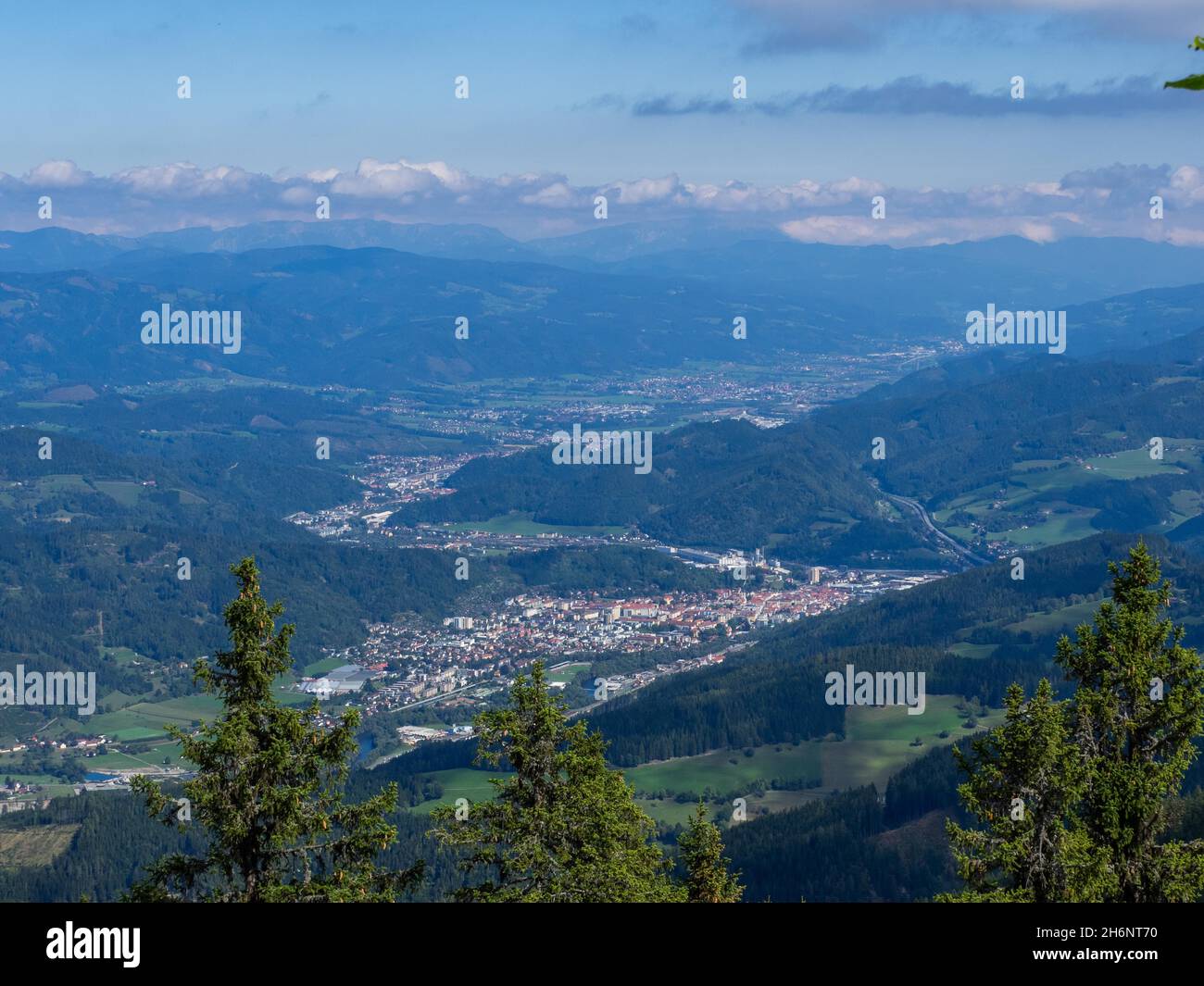 View from the summit of the Mugel over the towns of Bruck/Mur, Kapfenberg and the Muerz Valley, Mugel, Styria, Austria Stock Photo
