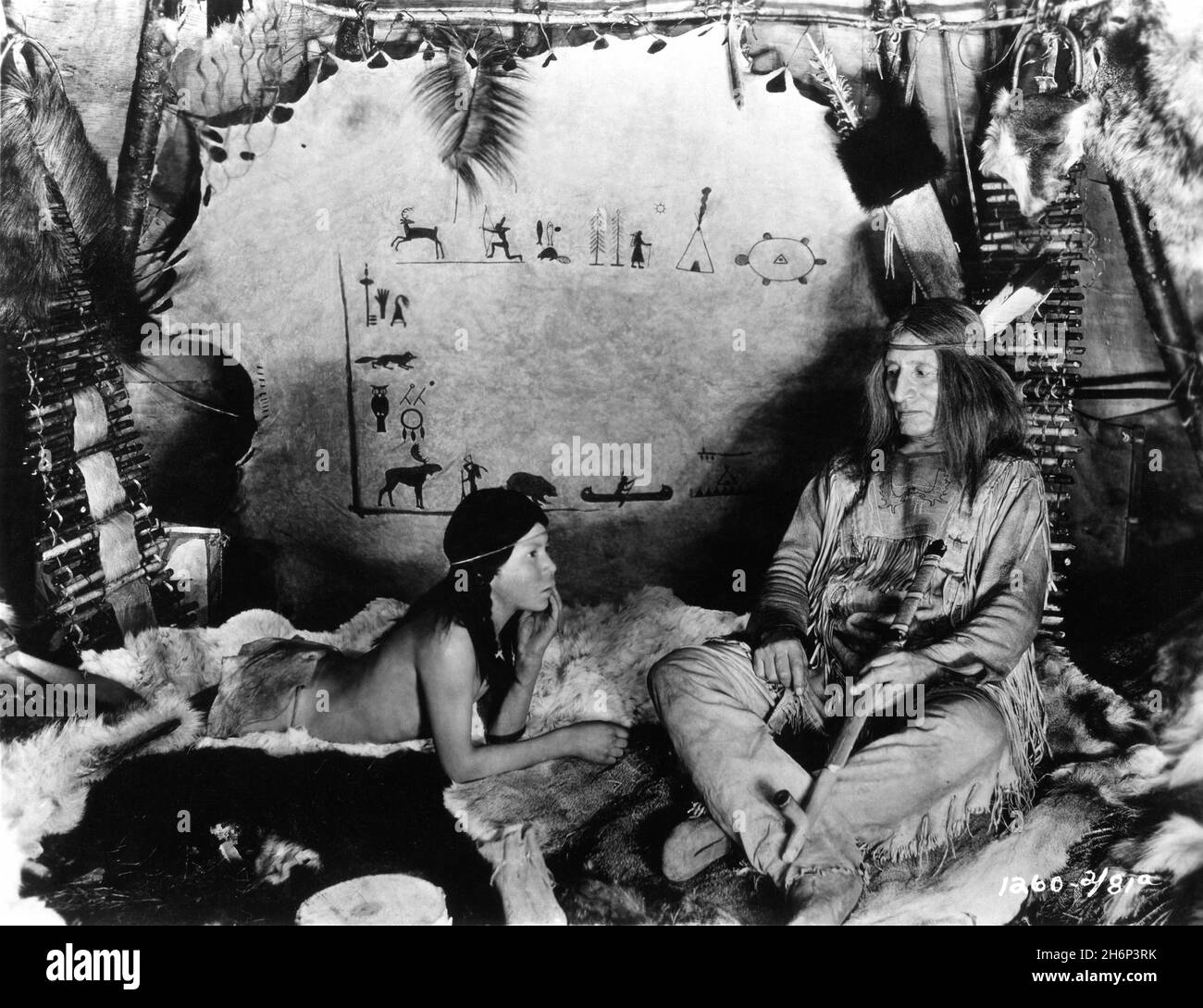 CHEEKA and CHIEF YELLOW ROBE in Documentary / Drama of the Life of Indians in Northern Canada THE SILENT ENEMY 1930 director H.P. CARVER story W. Douglas Burden scenario Richard Carver prologue Chief Yellow Robe Silent Film with Talking Sequence Burden-Chanler Productions / Paramount Pictures Stock Photo