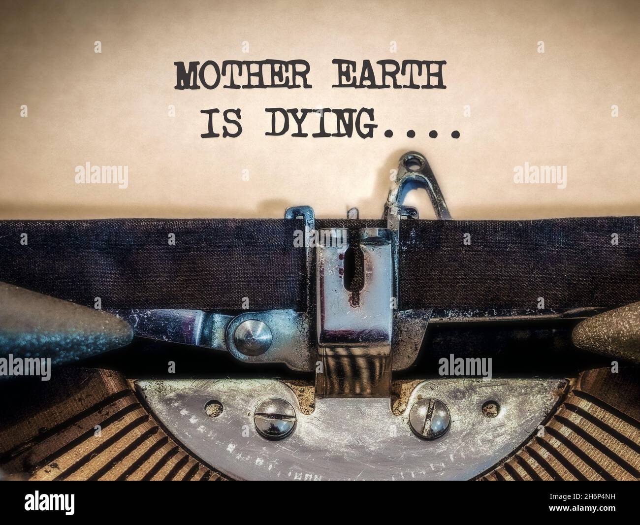 Vintage typewriter displaying Mother earth is dying Stock Photo