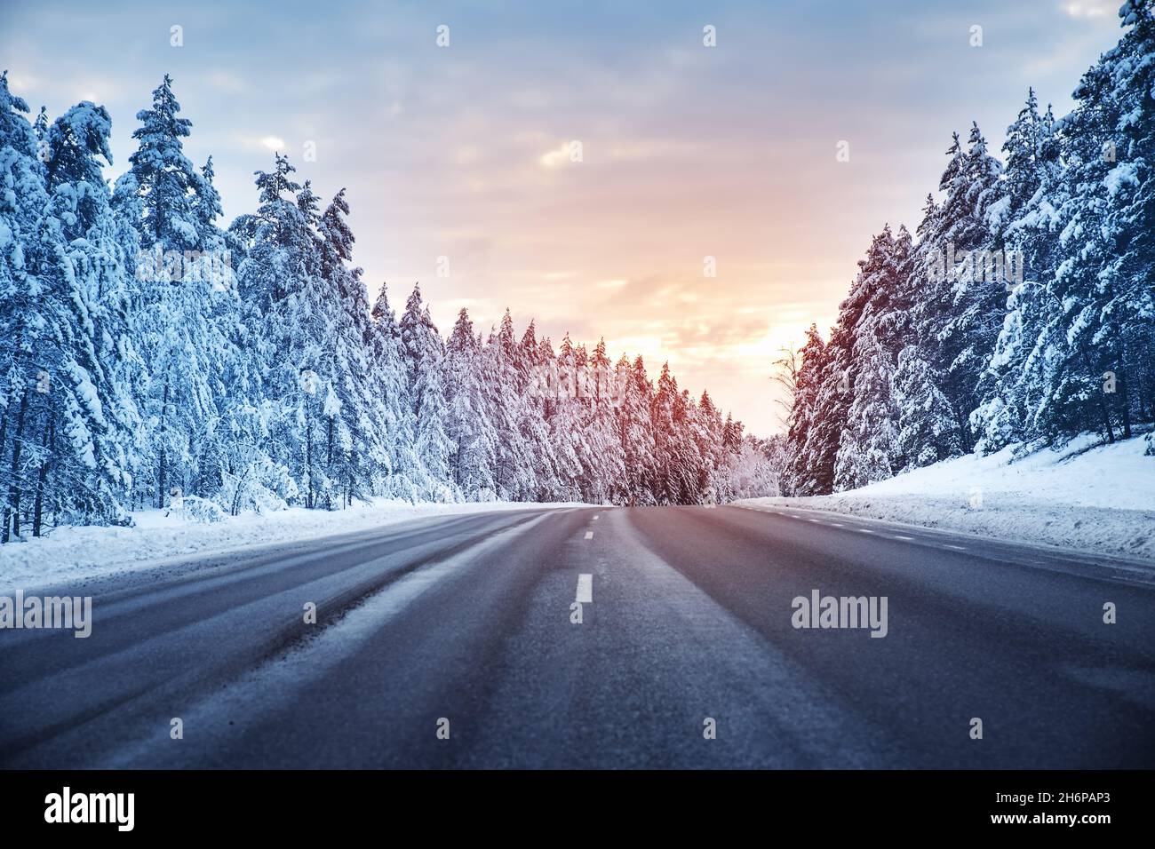 Beautiful view of the snowy curve country road in winter Stock Photo ...