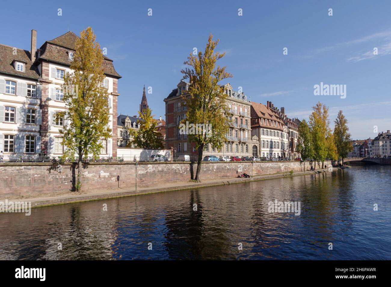 France, Strasbourg, Ill River canal with promenade and row of ...
