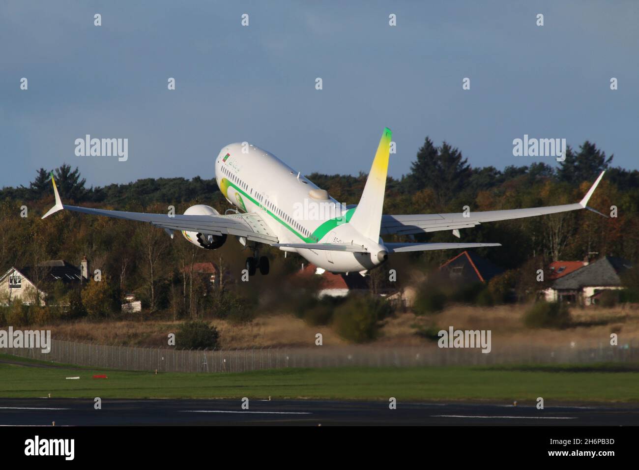 5T-CLJ, a Boeing 737 MAX 8 operated by Mauritania Airlines, departing from Prestwick International Airport in Ayrshire, Scotland, The aircraft was in Scotland to bring Mauritanian delegates to the COP26 climate change conference held in the nearby city of Glasgow. Stock Photo