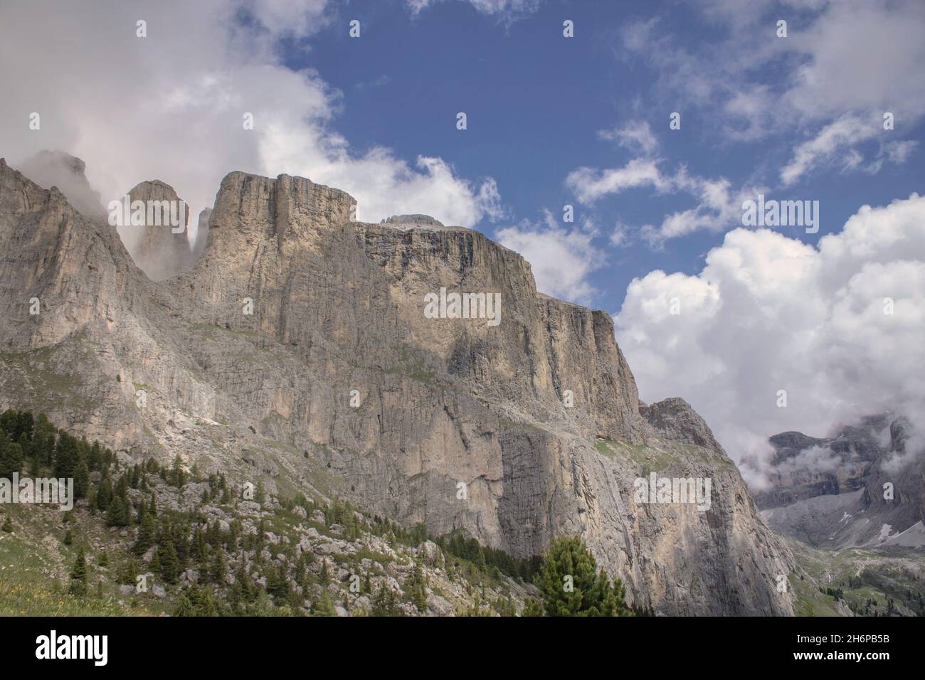 View of Dolomites with blue sky and clouds Stock Photo - Alamy