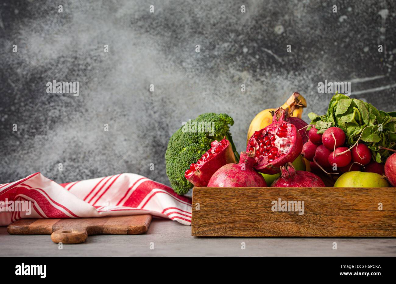 Kitchen table with fruit and vegetables Stock Photo