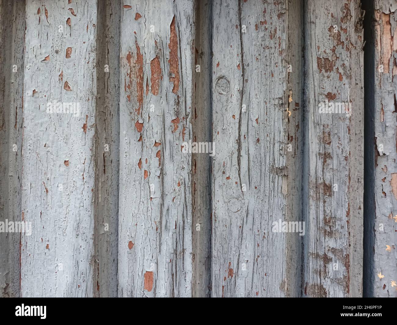 Wooden old cracked painted colored into light blue. Stock Photo