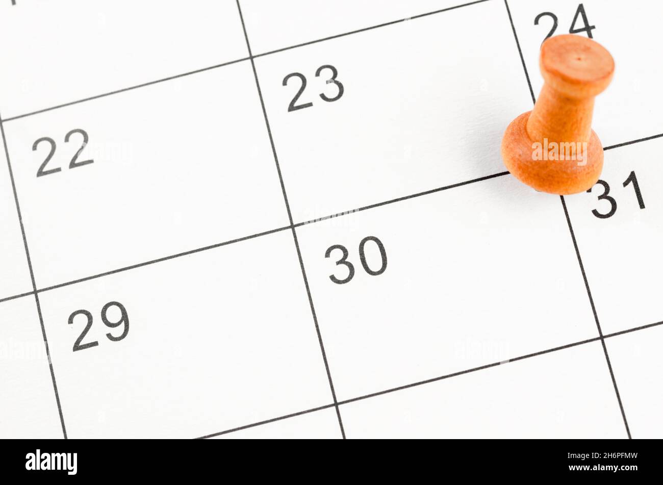 Embroidered Wooden Pin On A Blank Calendar On The 30th For Your Text Or embroidered-wooden-pin-on-a-blank-calendar-on-the-30th-for-your-text-or