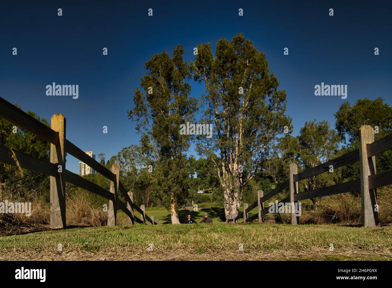 Shot of wooden fence in a farmland Stock Photo - Alamy