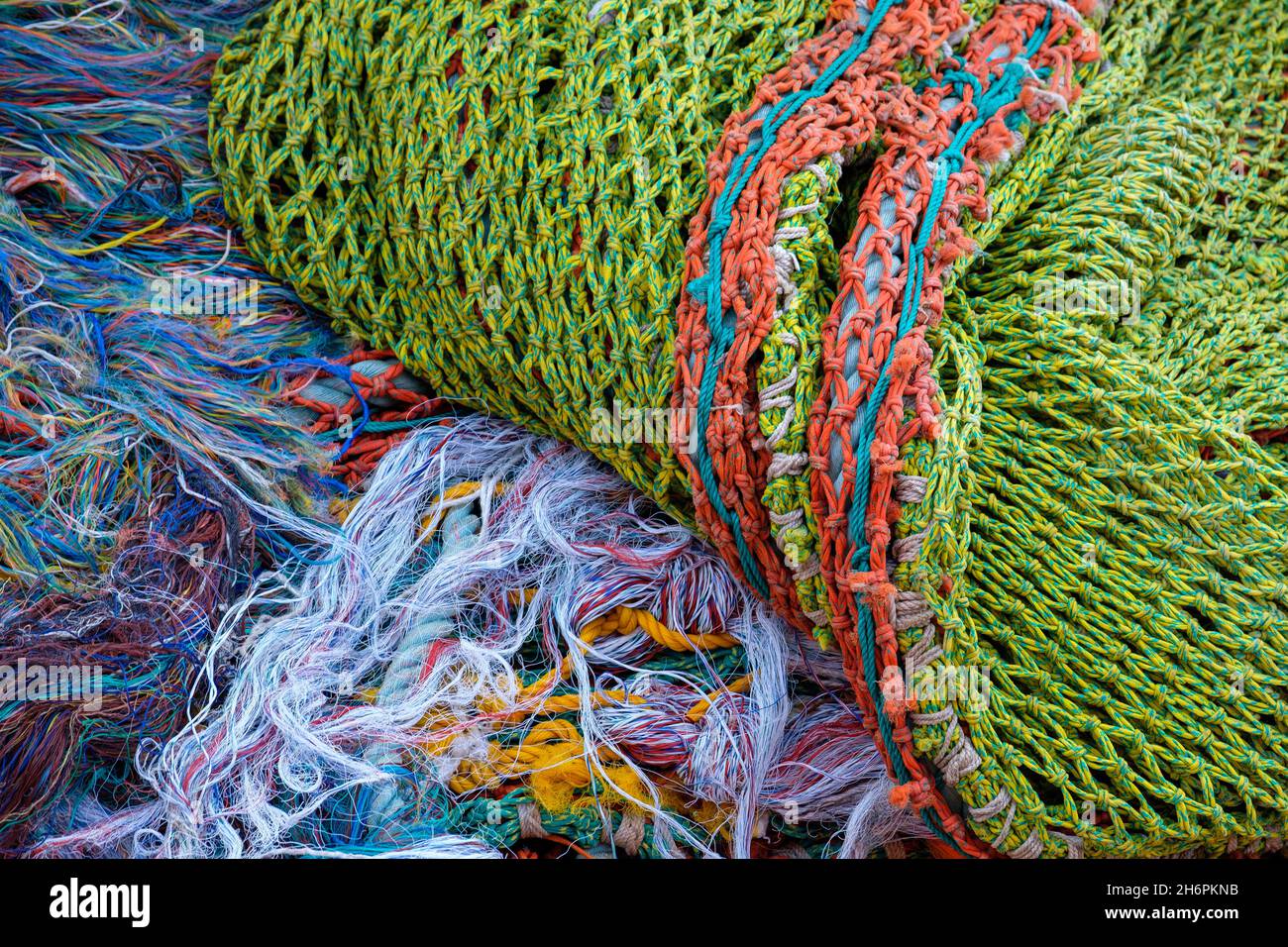 Fishing net on a fishing vessel deck. Close-up shot. Stock Photo