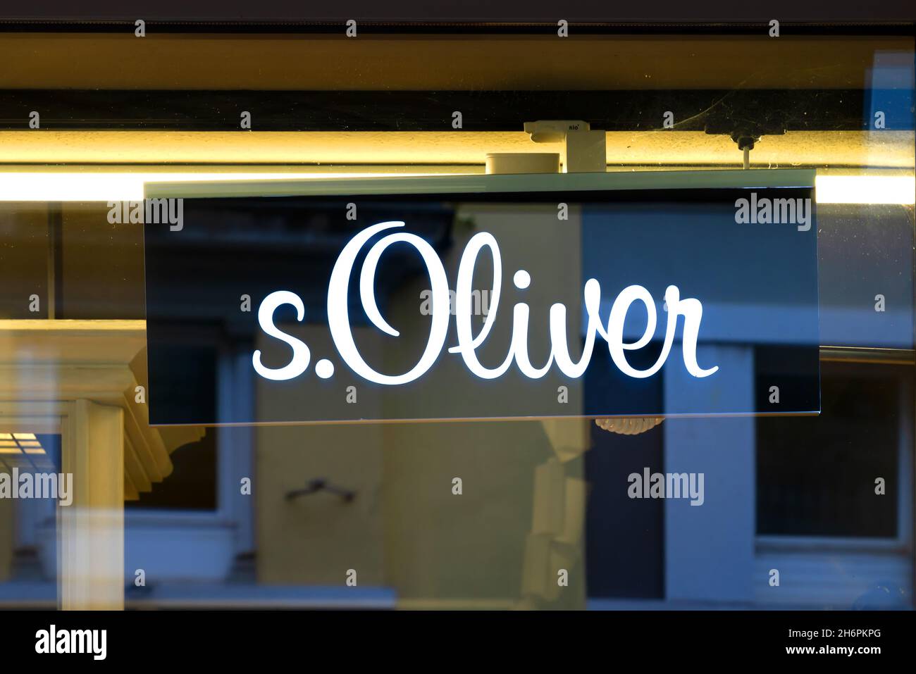 S.Oliver logo in a shop window. S.Oliver was founded in 1968 and as of 2011 employed about 7,000 people worldwide. Stock Photo
