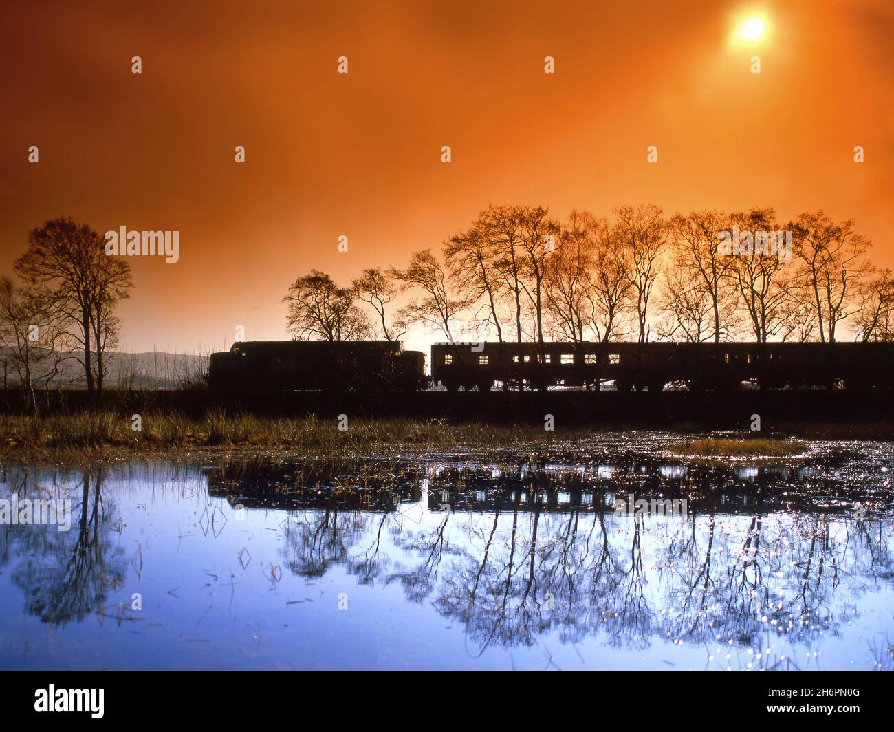 class-37-pulling-the-oban-to-glasgow-train-captured-on-the-shore-of