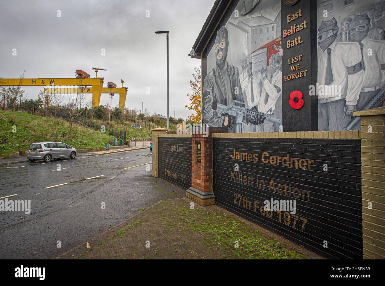 Ulster Volunteer Force (UVF) loyalist mural with Harland & Wolff shipyard in background, East Belfast ,Northern Irland . Stock Photo