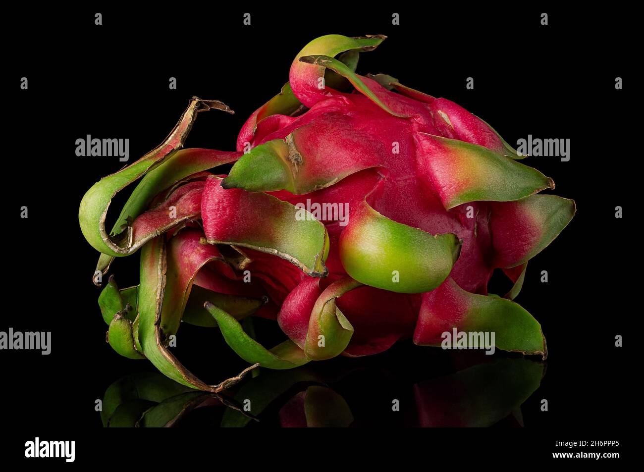 Dragon fruit horizontally rotated on a black background Stock Photo
