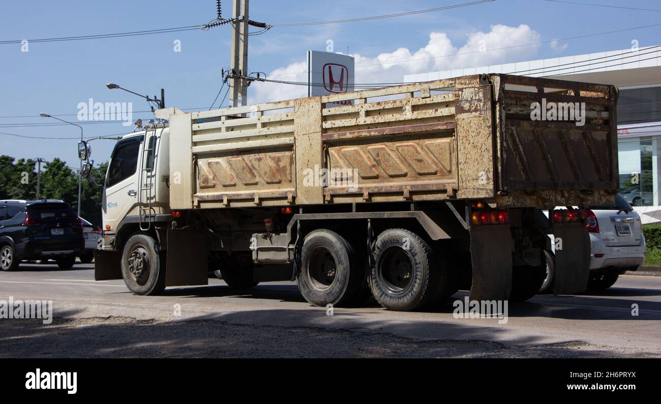 Chiangmai, Thailand - October  6 2021: Private Mitsubishi Fuso  Dump Truck.  Photo at road no.121 about 8 km from downtown Chiangmai, thailand. Stock Photo