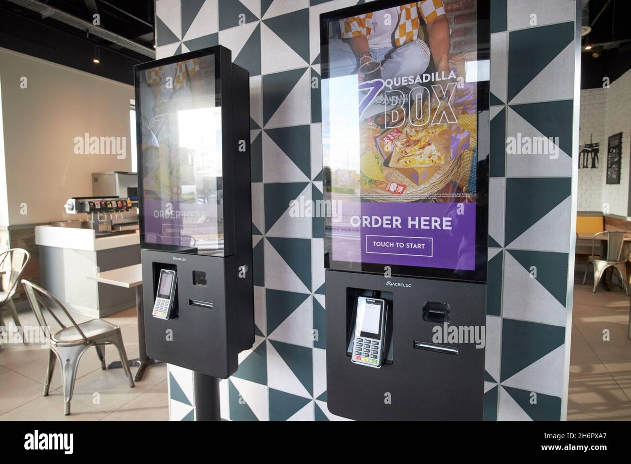 automatich touch screen ordering stations taco bell kirkby Liverpool merseyside uk Stock Photo