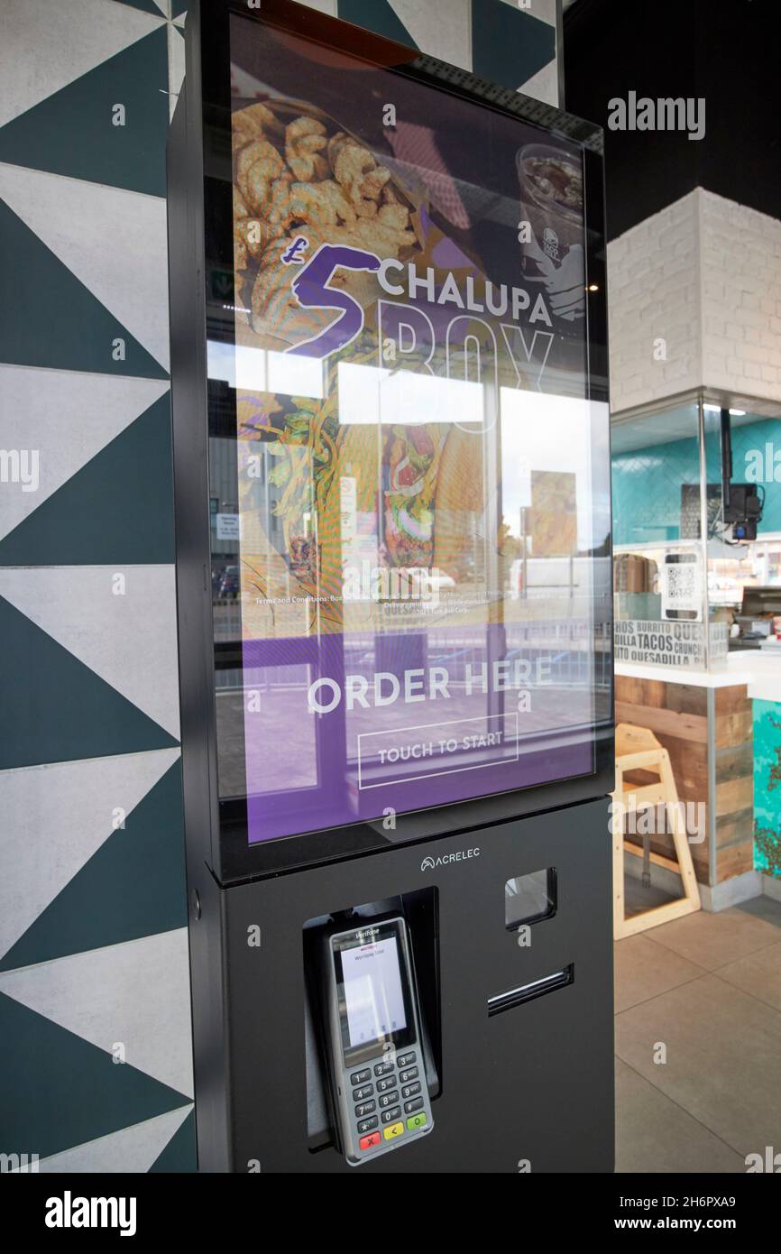automatich touch screen ordering station self service taco bell kirkby Liverpool merseyside uk Stock Photo