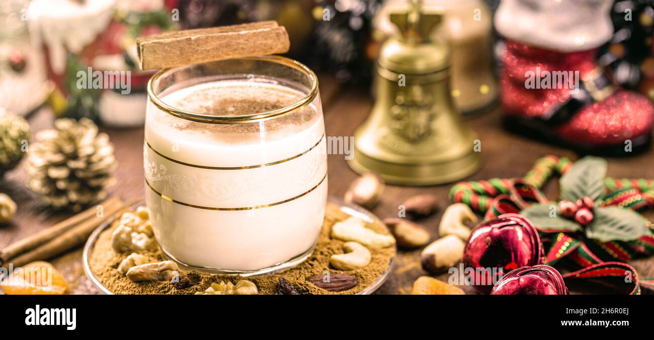 winter drink made with eggs, liqueur and cinnamon, called eggnog ...