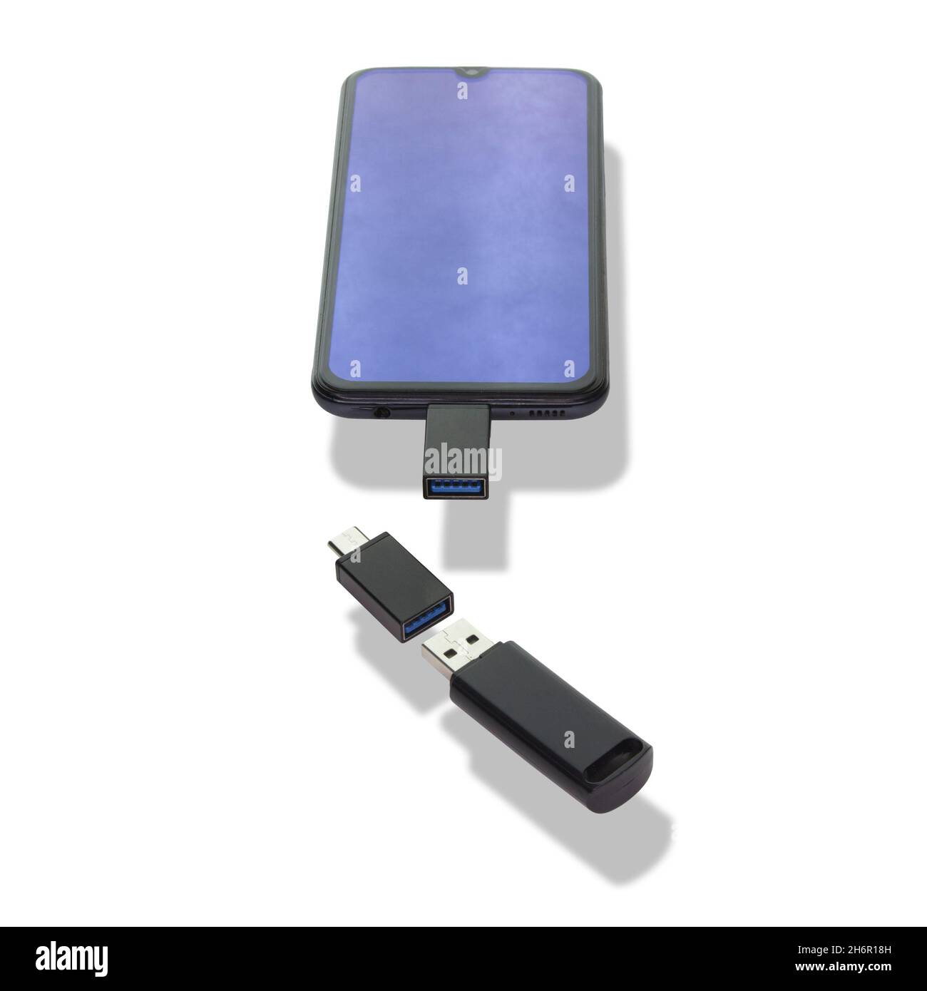 Phone or smartphone with USB OTG data transfer connected to a USB flash
