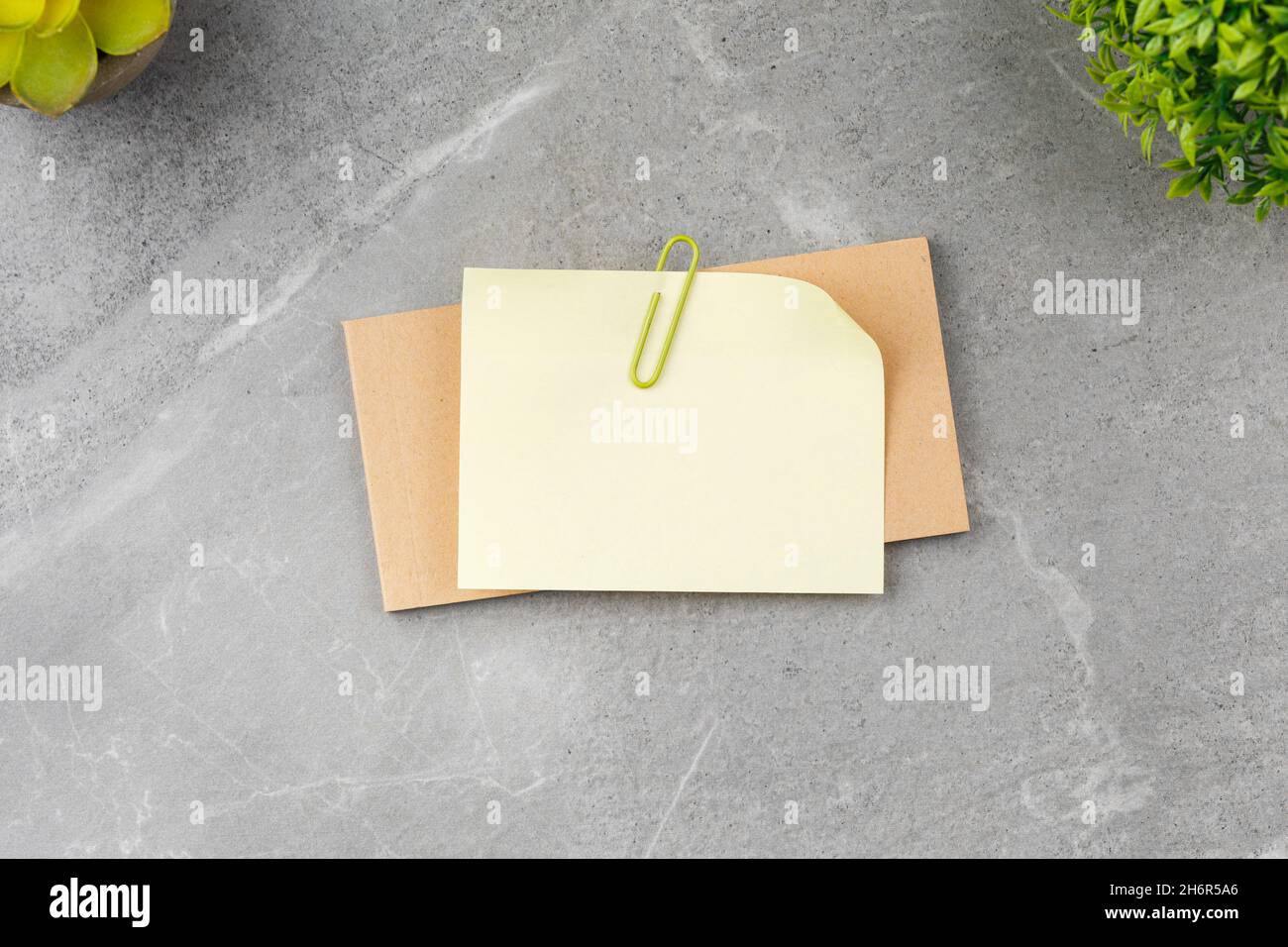 Open notepad on gray marble background Stock Photo